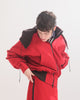 Person looking down wearing a red  bomber jacket with detachable hood with black accents on the elasticated waist and cuffs on a white background