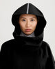 Close up of hood of black, waterproof, breathable, technical, sustainable and packable raincoat poncho suitable for cycling