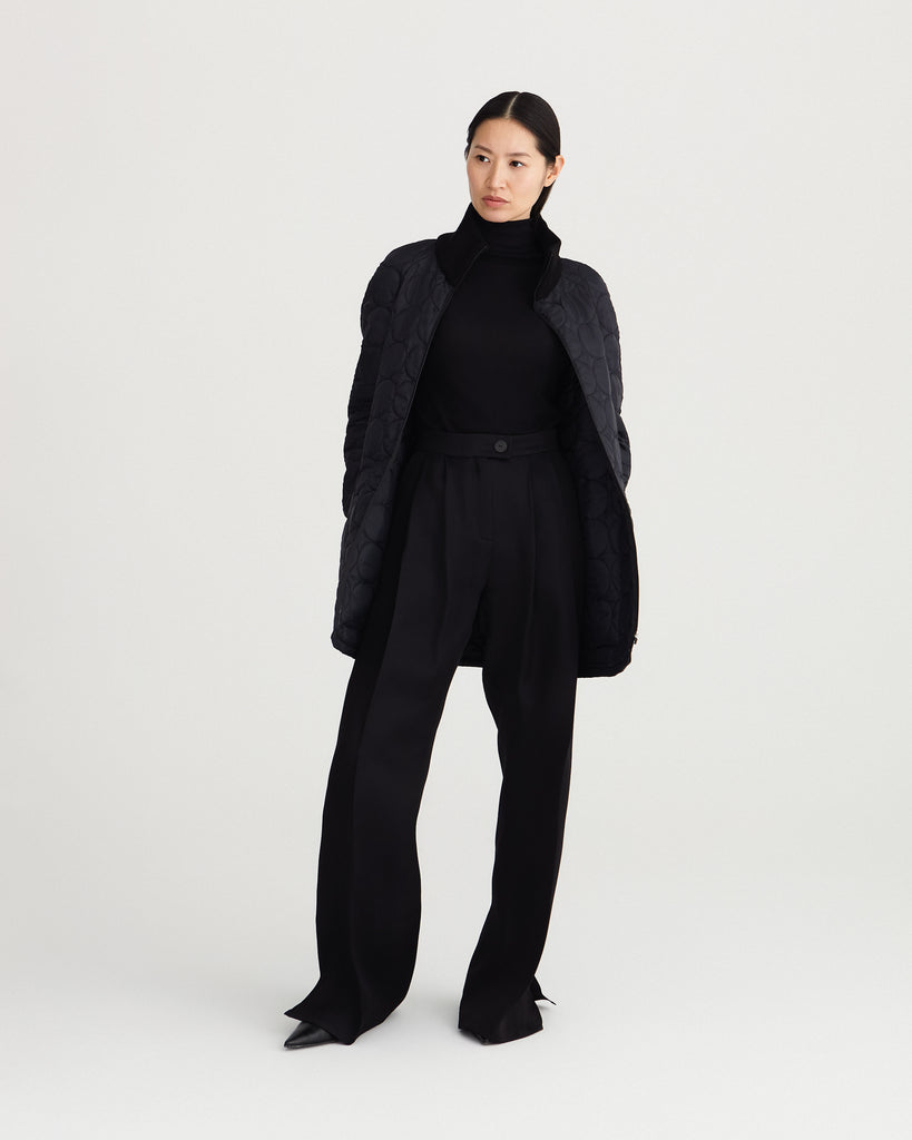 Sustainable, zipped, black, detachable liner for raincoat made from 100% recycled polyester