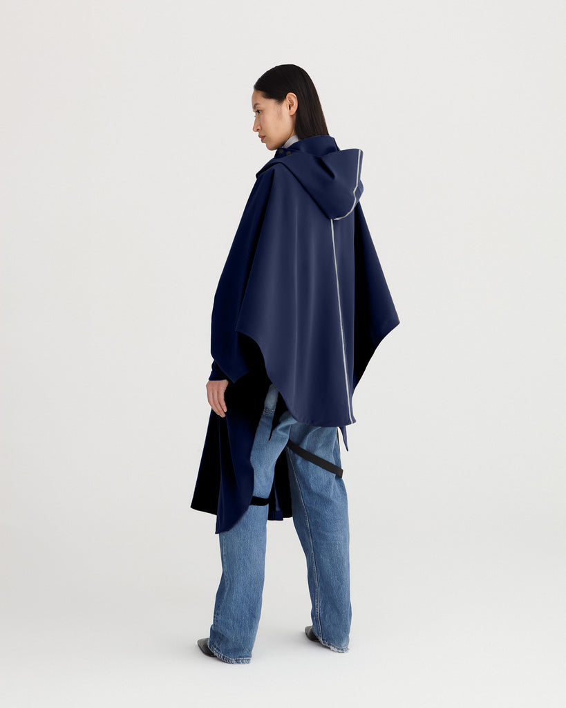 Navy blue, waterproof, breathable, technical, sustainable and packable raincoat poncho suitable for cycling